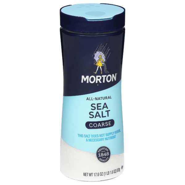 Morton all-natural coarse sea salt container, 17.6 oz, featuring a blue and white design. The label highlights that the salt does not supply iodine, emphasizing its natural quality and trusted brand history since 1848.