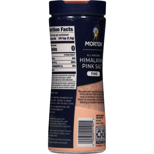 Fine Himalayan pink salt from Morton in a clear container, showcasing nutrition facts and usage instructions, ideal for enhancing flavor in cooking and baking.