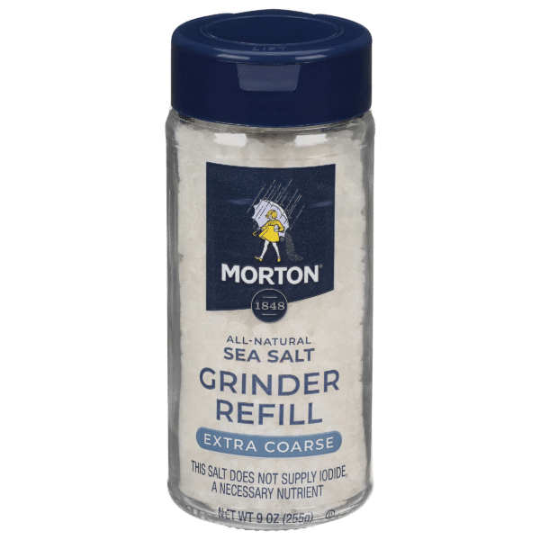 Morton all-natural extra coarse sea salt grinder refill in a 9 oz container, ideal for enhancing flavor in cooking and seasoning.