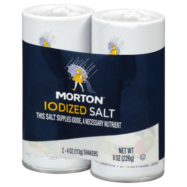 Morton iodized salt packaging featuring two 4-ounce shakers, labeled as a source of iodine, an essential nutrient for health.