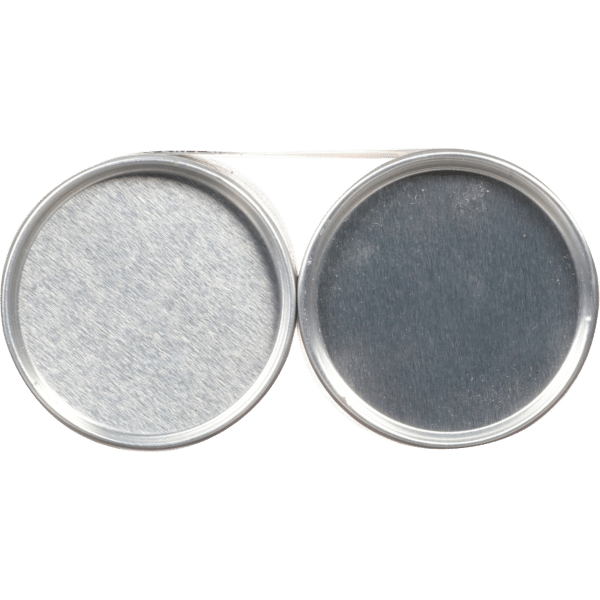 Two metal can lids, one with a brushed finish and the other with a smooth surface, positioned side by side against a black background. Ideal for packaging and sealing food or beverages.