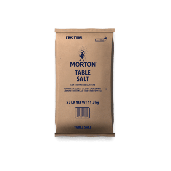 Package of Morton Table Salt, a 25-pound (11.3 kg) product, featuring food-grade sodium chloride. The bag includes information about sodium silicoaluminate and meets food chemicals codex specifications.