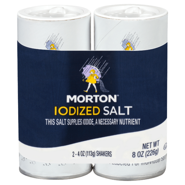 Two shakers of Morton iodized salt, each containing 4 ounces, packaged together. The label highlights that the salt supplies iodine, an essential nutrient for health. Total net weight is 8 ounces.