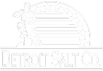 Logo of Detroit Salt Company featuring a figure holding a mining tool, set against a backdrop of stars and stripes, symbolizing American heritage and the salt mining industry.