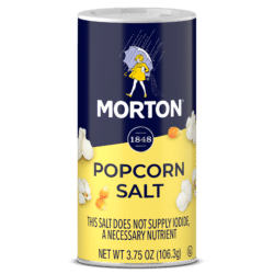 Morton Popcorn Salt container, 3.75 oz, featuring a blue and yellow design with popcorn graphics, labeled as not supplying iodine, ideal for enhancing the flavor of popcorn.