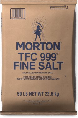 Morton TFC 999 Fine Salt packaging, featuring a 50 lb (22.6 kg) bag labeled as food-grade sodium chloride, suitable for various culinary uses and meets food chemicals codex specifications.