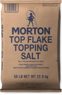 Brown paper bag of Morton Top Flake Topping Salt, featuring a vintage logo and product details, including food grade sodium chloride and specifications for culinary use, weighing 50 lbs (22.6 kg).