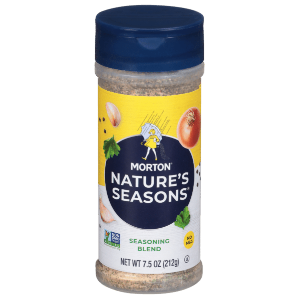 Morton Nature's Seasons seasoning blend in a 7.5 oz container, featuring a vibrant yellow label with images of garlic and onion, and indicating it is non-GMO and contains no MSG. Ideal for enhancing the flavor of various dishes.