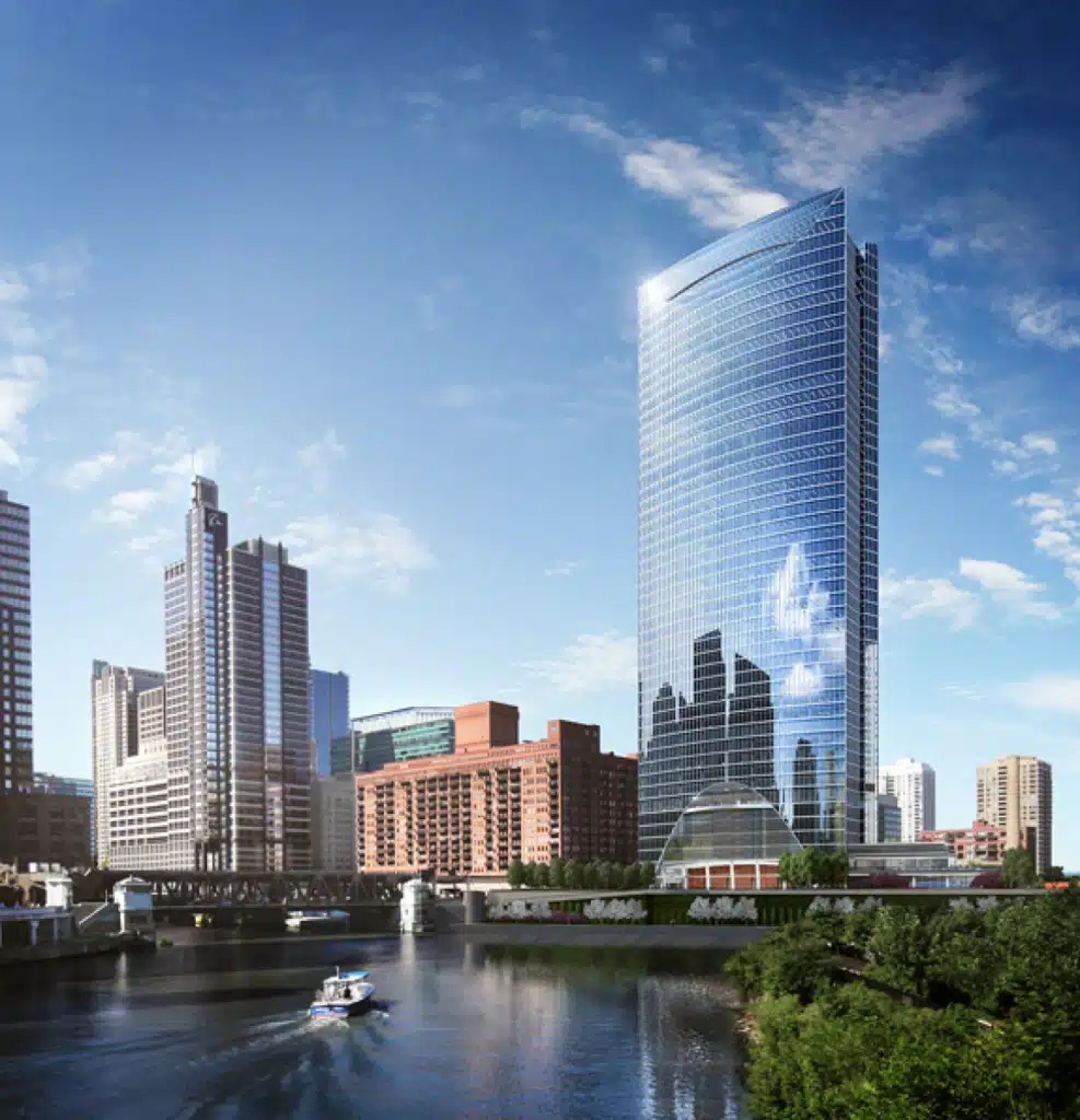 Modern skyscrapers lining the riverbank in a vibrant city skyline, showcasing a sleek glass building reflecting the sky, with a boat navigating the water in the foreground.