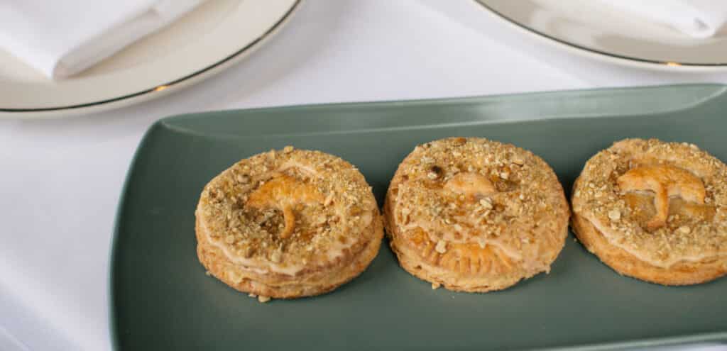 3 salted caramel mini pumpkin pies on a plate
