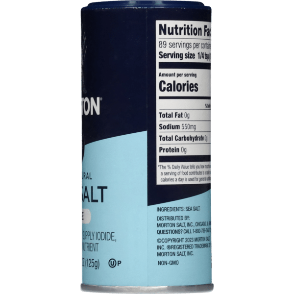 Container of Morton Natural Sea Salt with nutrition facts, including 89 servings per container, 0g total fat, 550mg sodium, and 0g protein. Non-GMO product, distributed by Morton Salt, Inc.