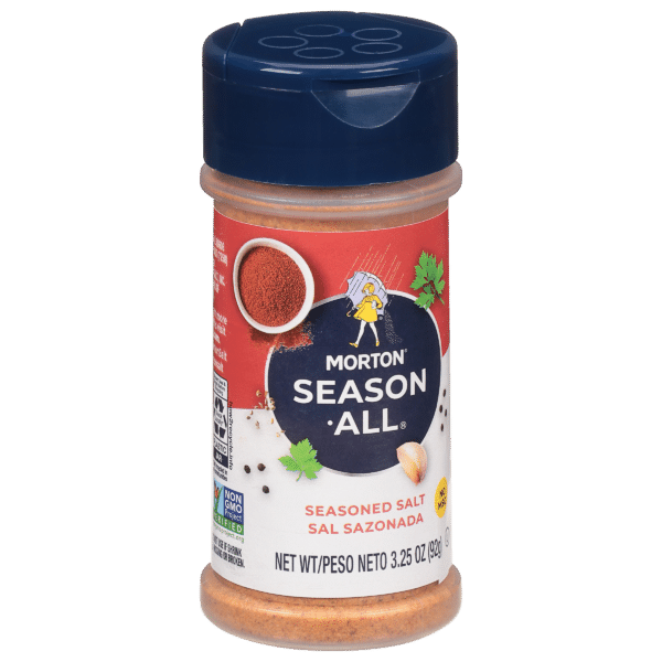 Morton Season-All seasoned salt container, 3.25 oz, featuring a blue lid and a vibrant design with spices and herbs, labeled as Non-GMO Project Verified.
