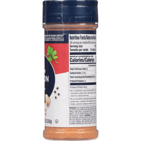 Container of seasoning with nutrition facts label, including serving size, calories, sodium, and ingredients like salt, chili pepper, and paprika. Ideal for enhancing flavor in various dishes.