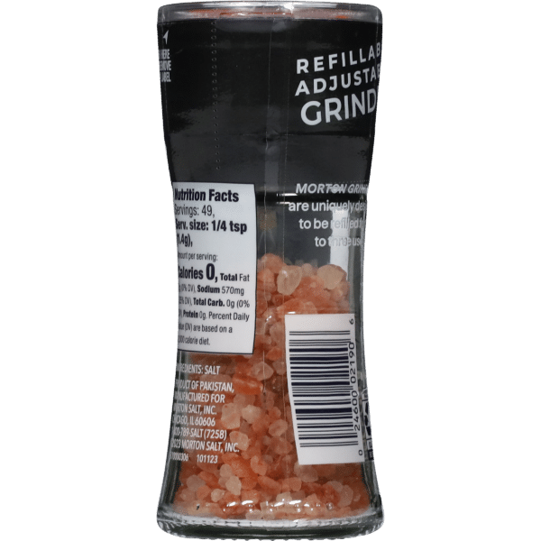 Refillable adjustable grinder containing pink Himalayan salt, featuring nutrition facts and ingredient information on the label. Ideal for seasoning dishes, with 49 servings per container and zero calories per serving.