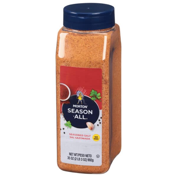 Morton Season-All seasoned salt in a 35 oz container, featuring a blend of spices without MSG, ideal for enhancing the flavor of various dishes.