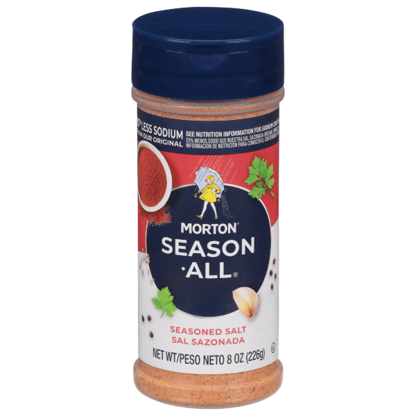 Morton Season-All seasoned salt container, 8 oz, featuring a blue lid and colorful label with a character and various spices depicted. Ideal for enhancing the flavor of a variety of dishes.