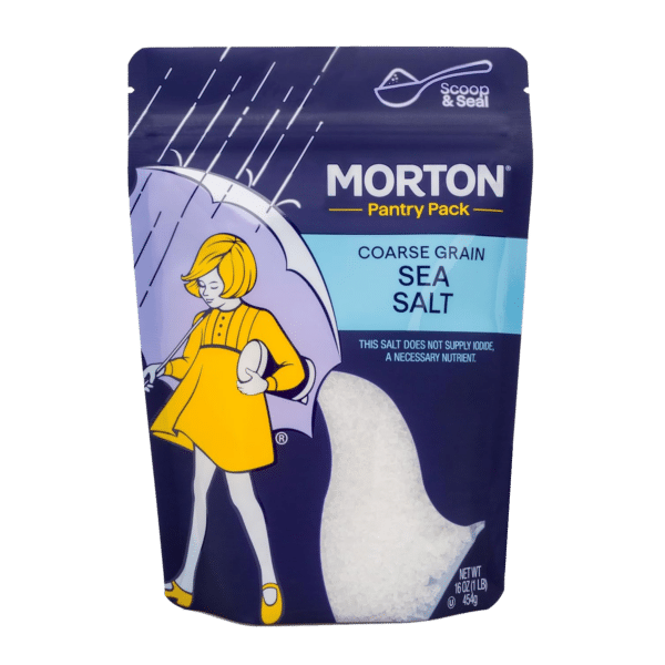 Morton coarse grain sea salt pantry pack in a resealable bag, featuring a playful illustration of a girl with an umbrella, 16 oz (454 g) packaging. Ideal for enhancing flavors in cooking and baking.