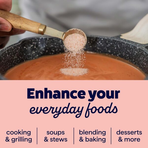 Close-up of a hand using a measuring spoon to sprinkle seasoning into a pot of soup, showcasing cooking techniques for enhancing everyday meals including soups, stews, baking, and grilling.