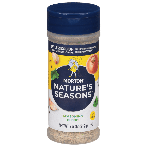 Morton Nature's Seasons seasoning blend in a 7.5 oz container, featuring a label highlighting 25% less sodium and no MSG. Ideal for enhancing the flavor of various dishes.