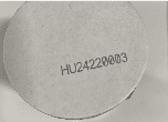 Close-up view of a circular object with the serial number HU242280003 printed on its surface, showcasing product identification for inventory or tracking purposes.